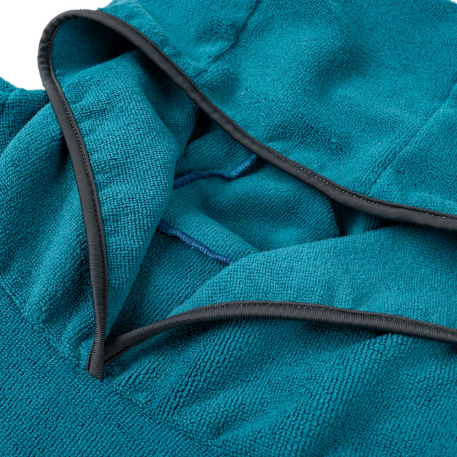 Ronix Change Poncho, sea-blue fabric and dark-trimmed pocket detail