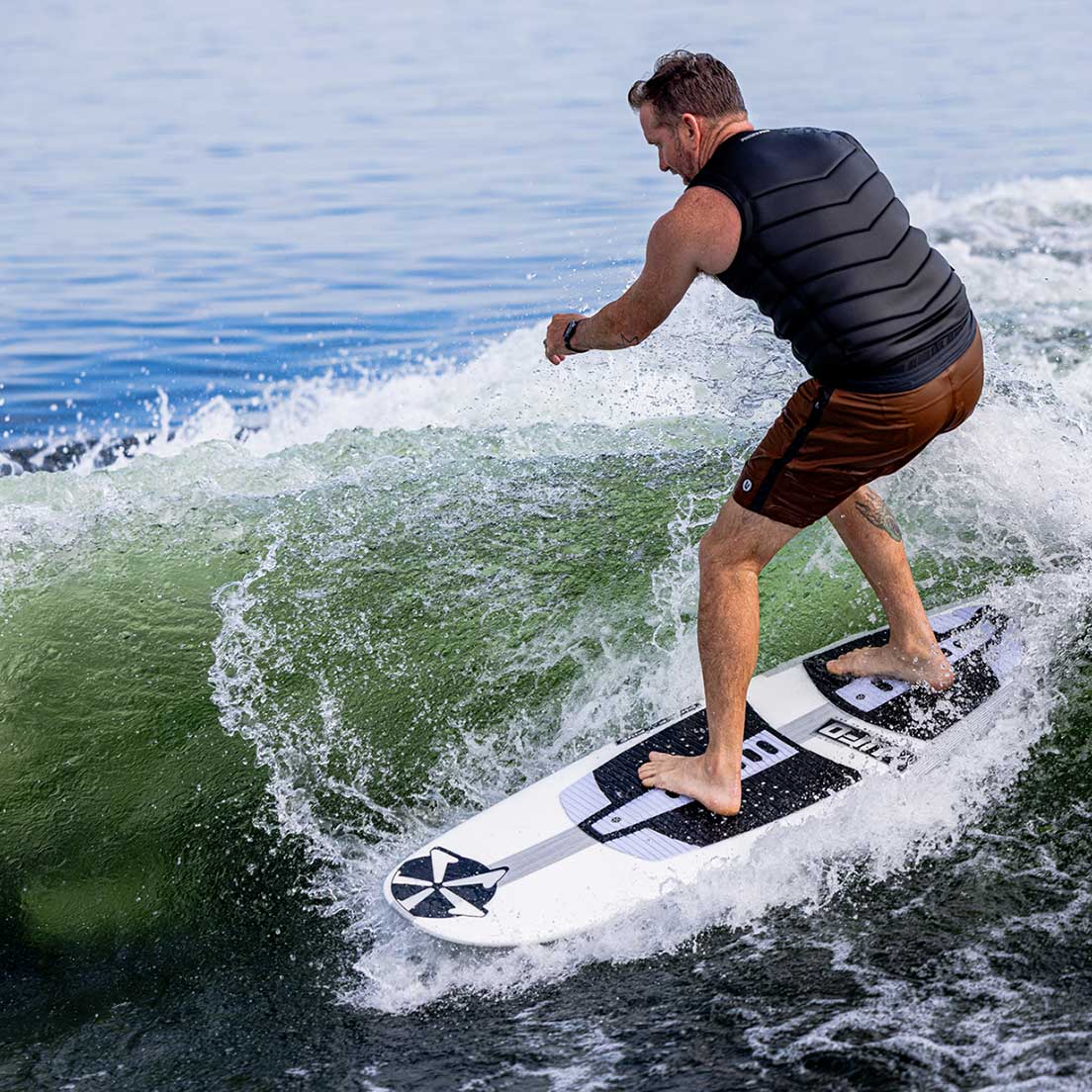 Phase 5 UFO Wakesurf Board 2027 – rider turning on the wave