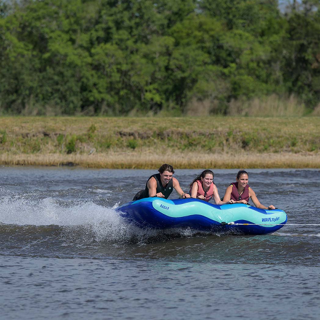 Radar Wave Rider 3 Person Tube in Ocean Dream, riders crossing the wake