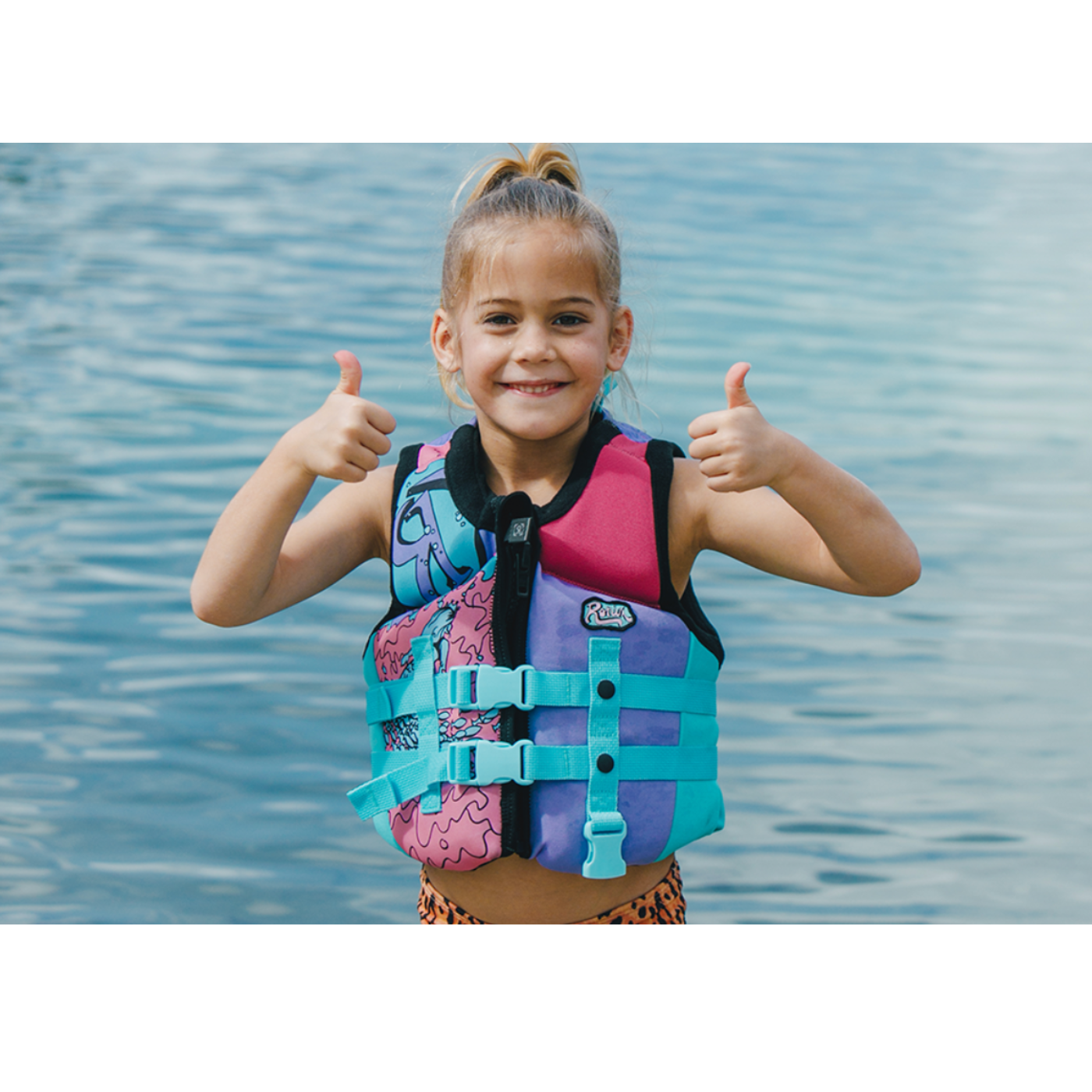 Ronix August Girl's CGA Life Jacket in Pink / Blue