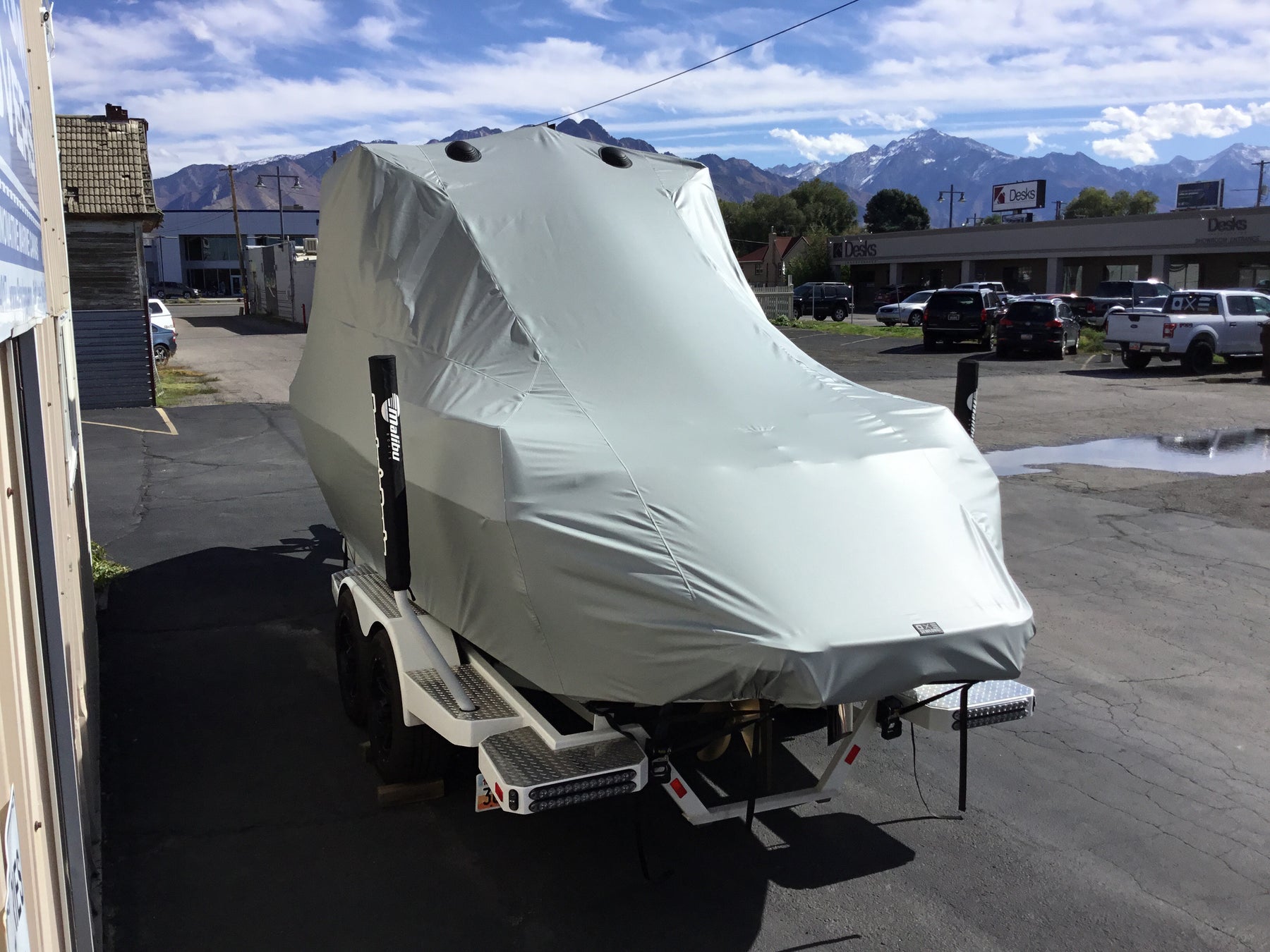Malibu 23 LSV Wakesetter W/G5 Tower and Factory Bimini Double Up Storage Cover