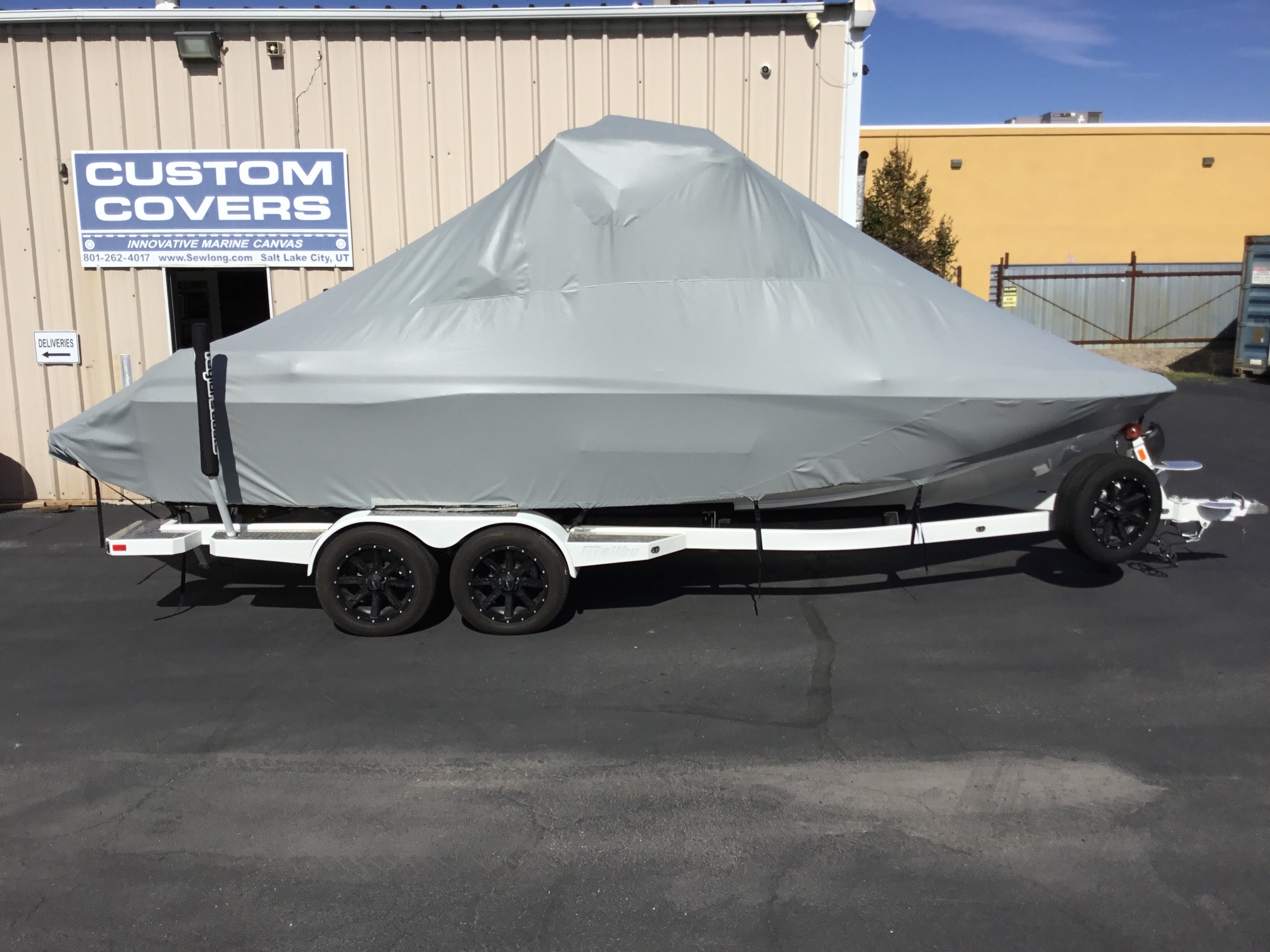 Malibu 23 LSV Wakesetter W/G5 Tower and Factory Bimini Double Up Stora
