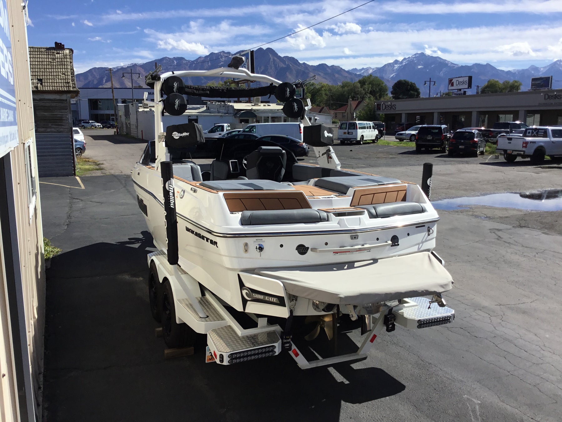 Malibu 23 LSV Wakesetter W/G5 Tower and Factory Bimini Double Up Storage Cover