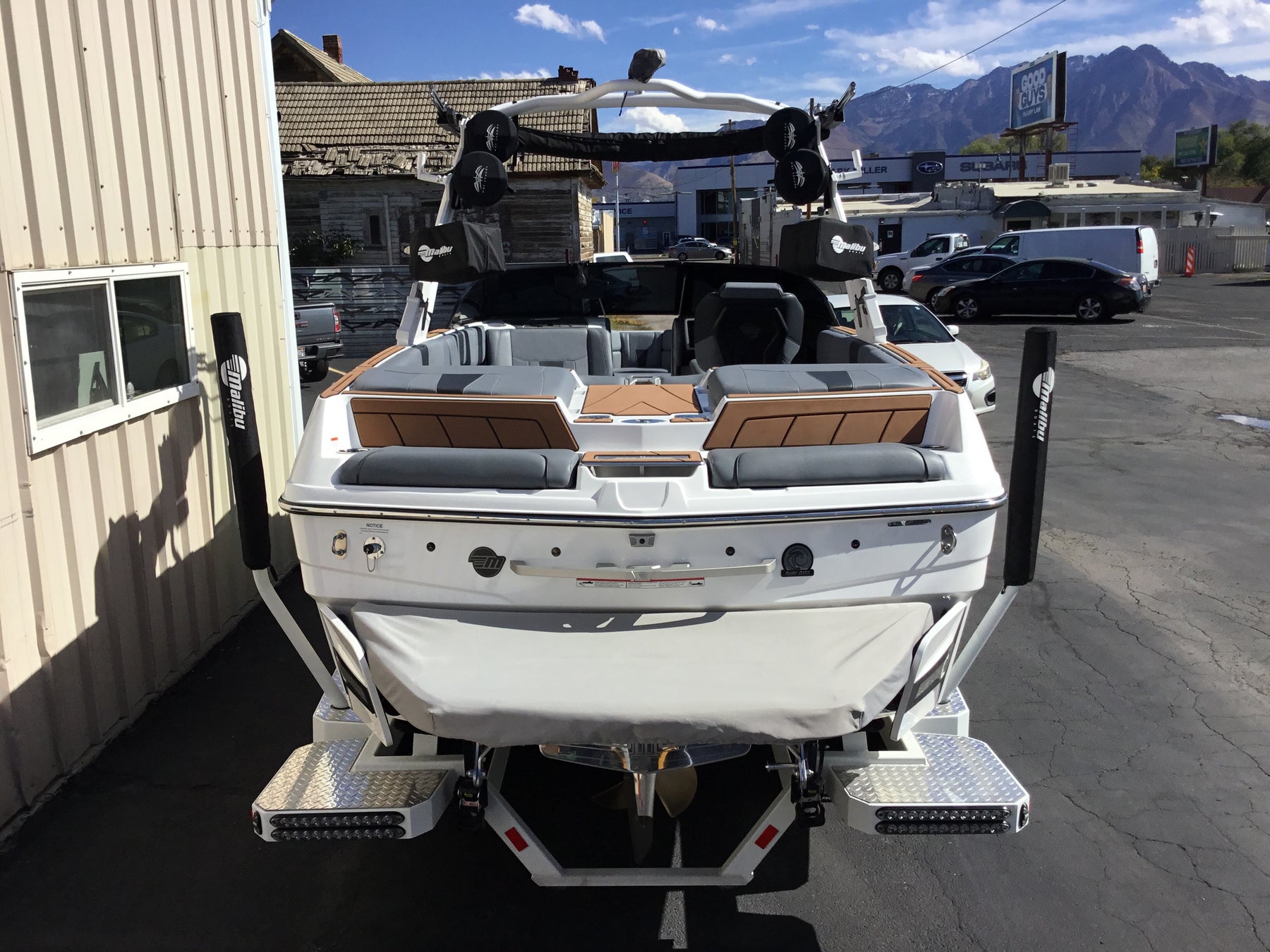 Malibu 23 LSV Wakesetter W/G5 Tower and Factory Bimini Double Up Storage Cover
