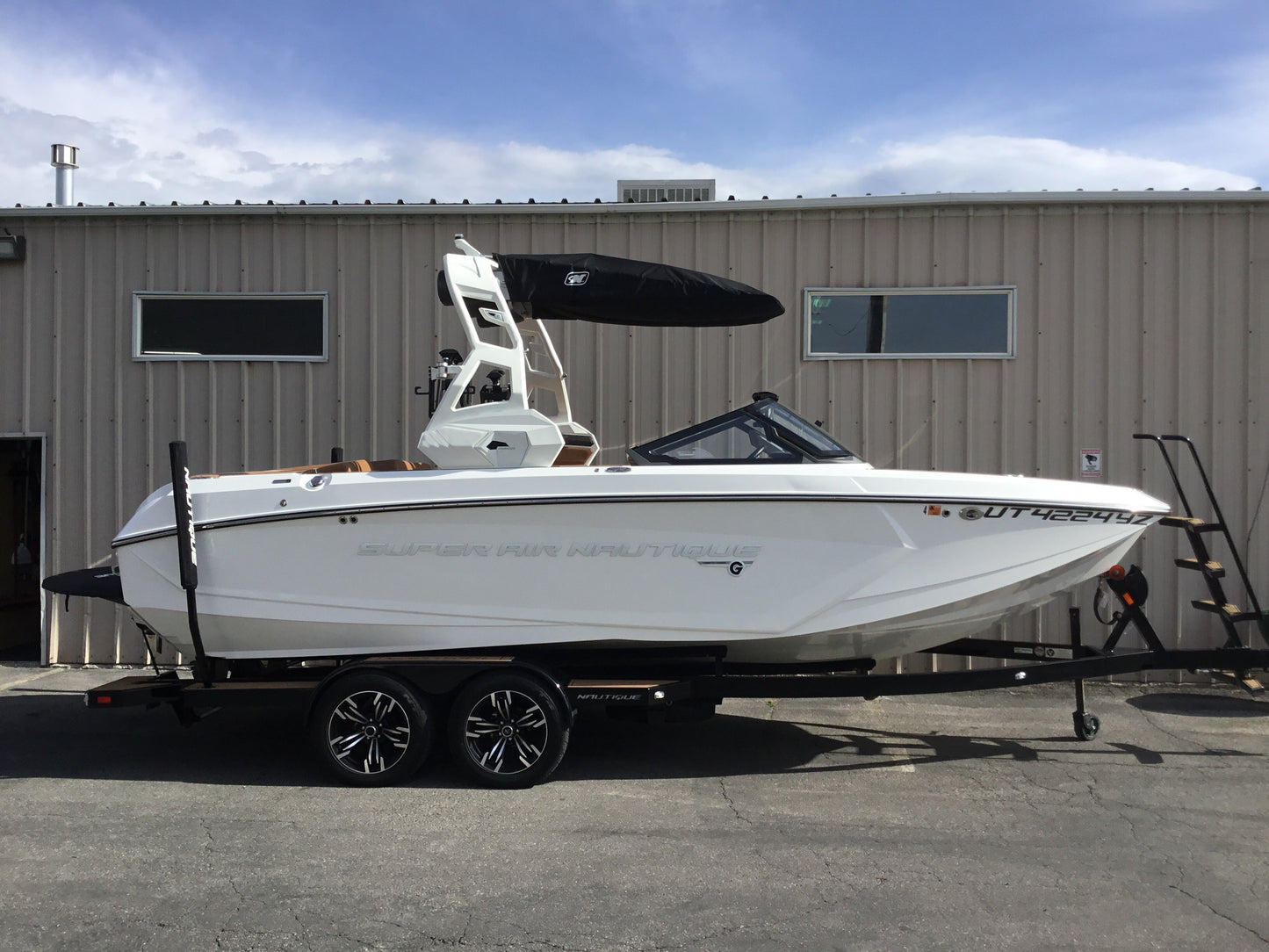 Nautique G25 with FCT19 Tower and Factory Bimini Double Up Storage Cover