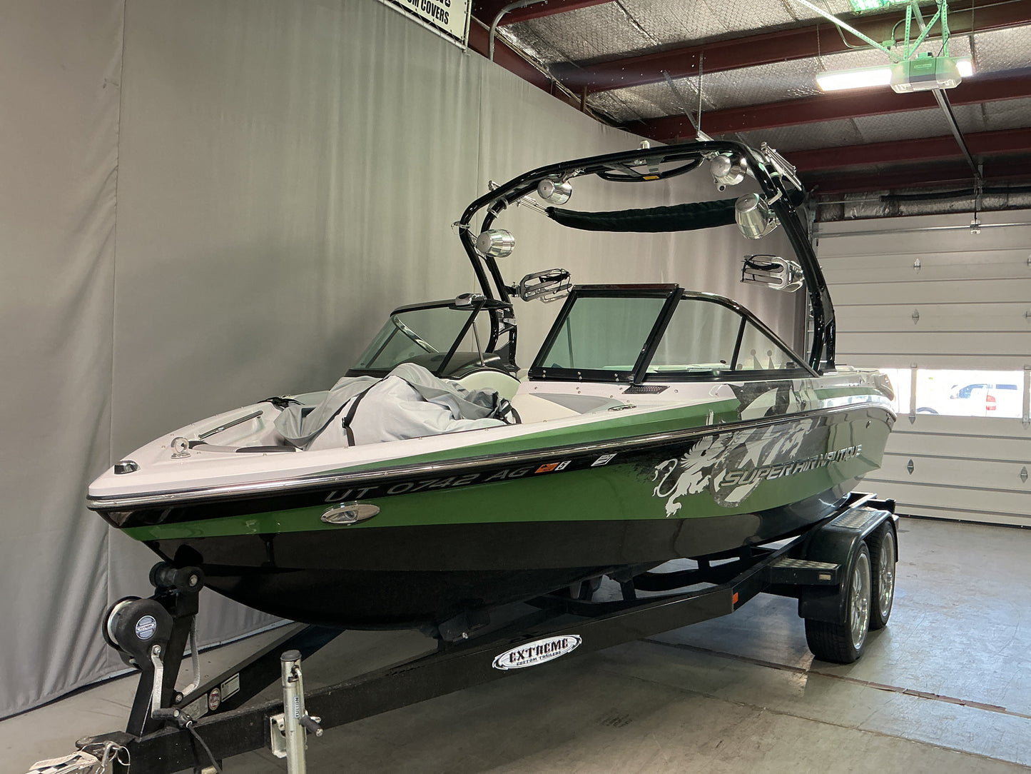 Nautique 210 with FCT-3 Tower and Sewlong Bimini Double Up Storage Cover