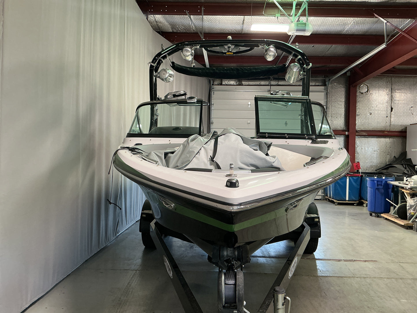 Nautique 210 with FCT-3 Tower and Sewlong Bimini Double Up Storage Cover