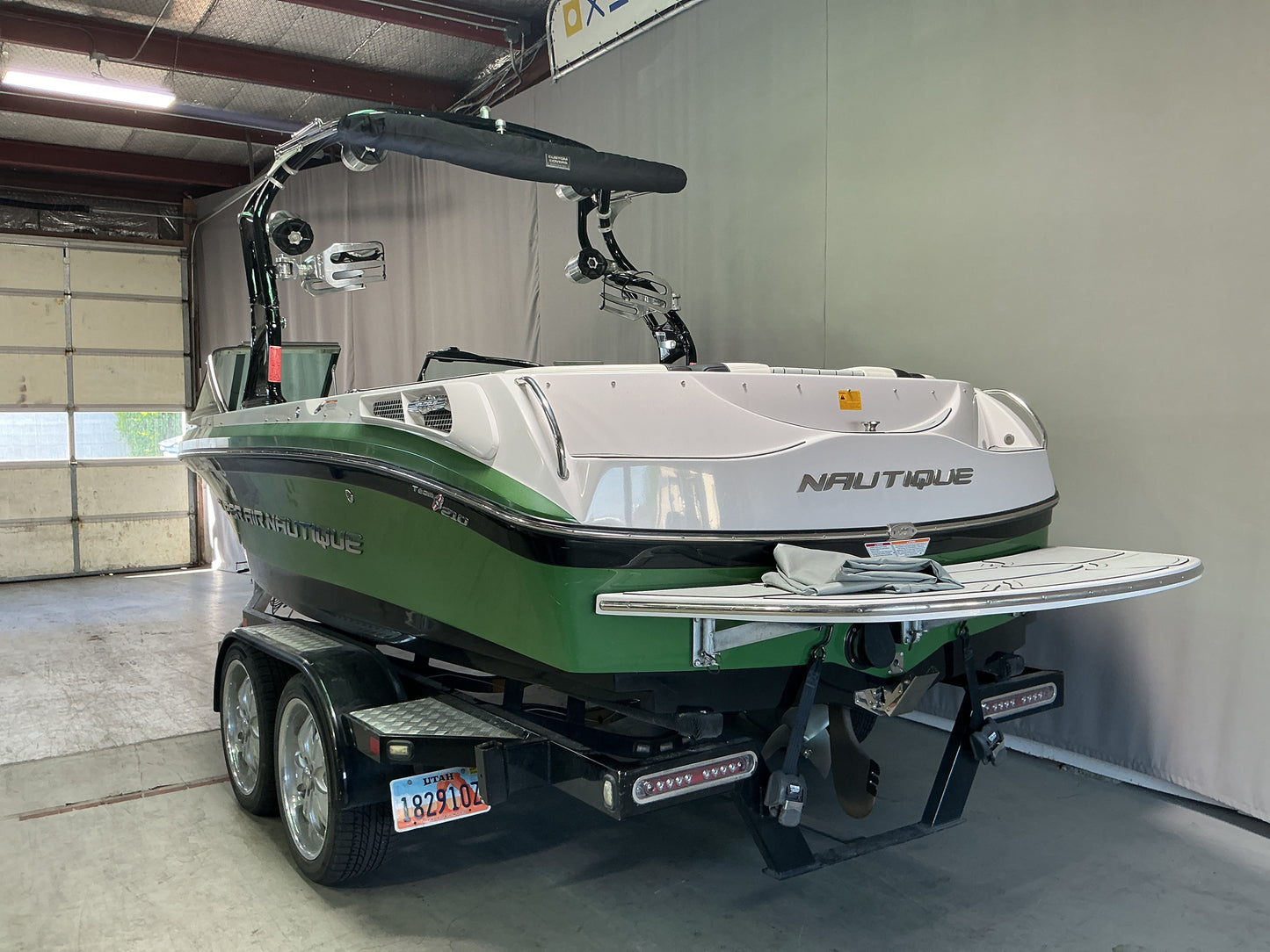 Nautique 210 with FCT-3 Tower and Sewlong Bimini Double Up Storage Cover
