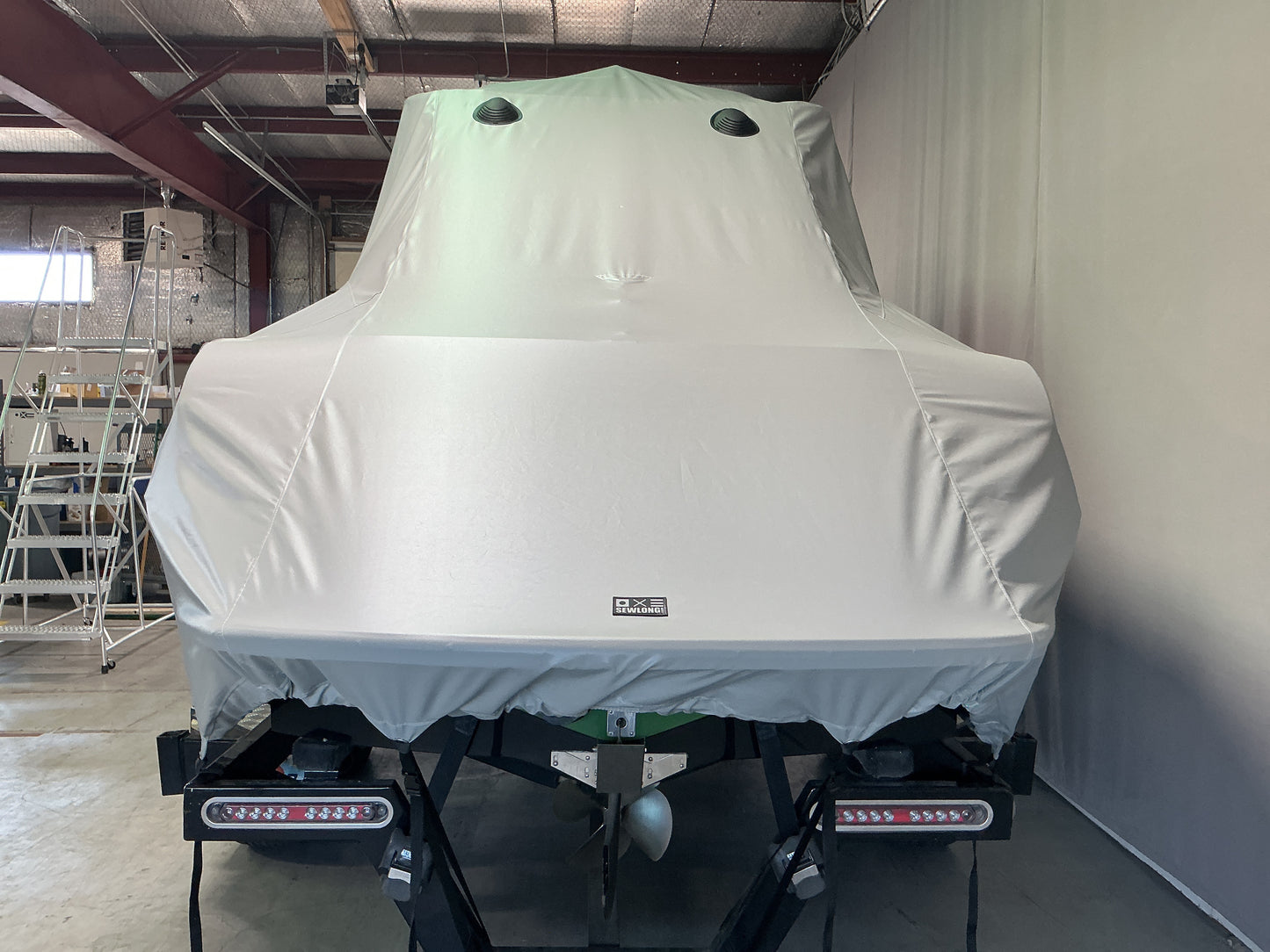 Nautique 210 with FCT-3 Tower and Sewlong Bimini Double Up Storage Cover