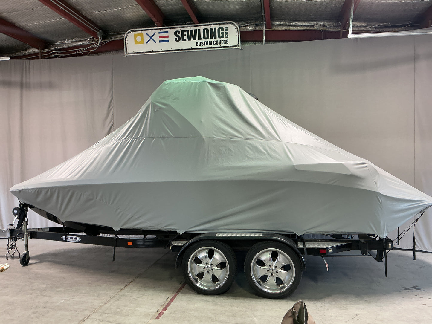 Nautique 210 with FCT-3 Tower and Sewlong Bimini Double Up Storage Cover