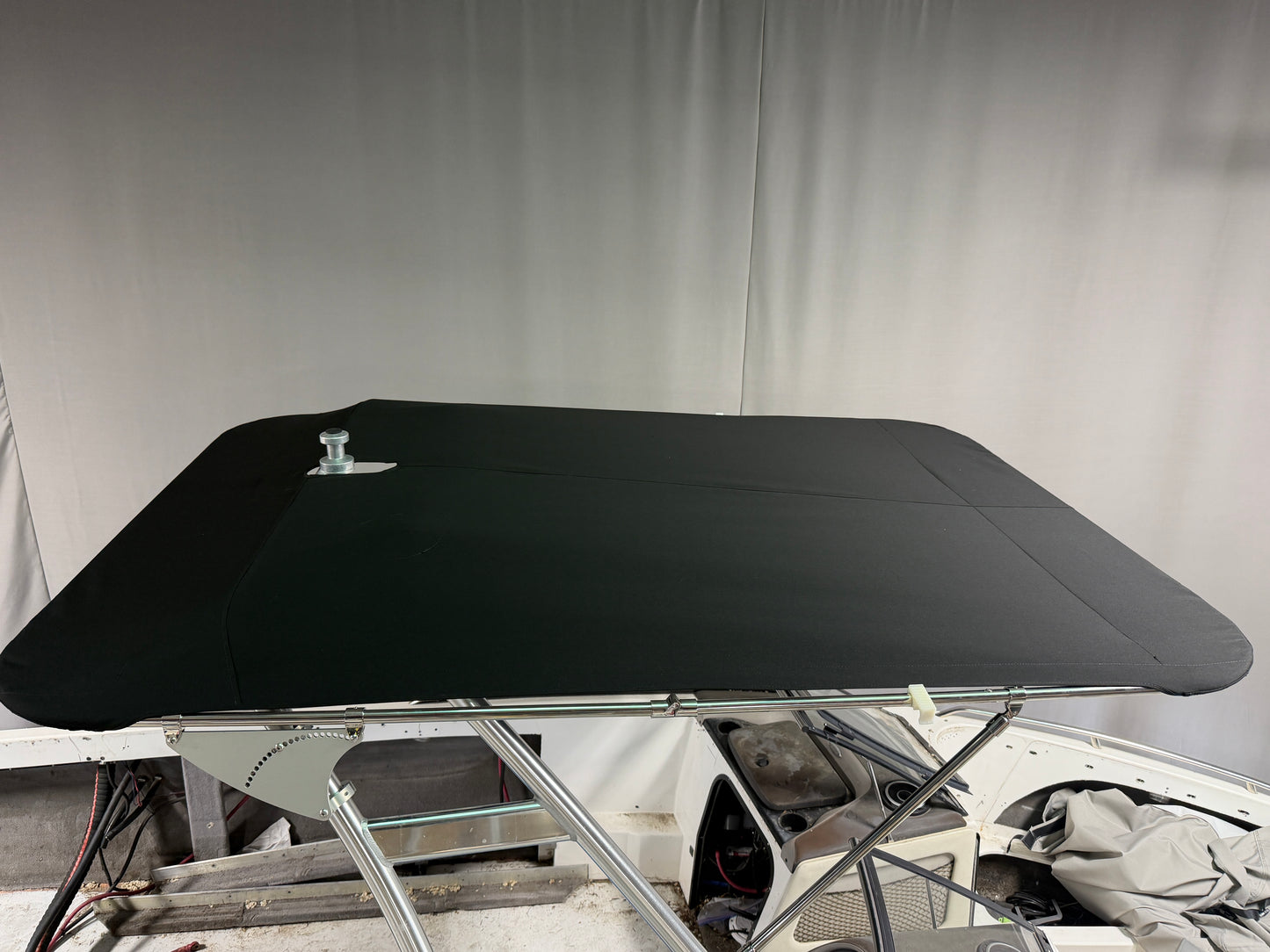 Malibu Wakesetter with Skylon Swoop tower Folding Canopy Top