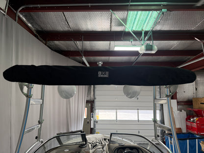 Malibu Wakesetter with Skylon Swoop tower Folding Canopy Top