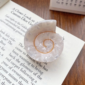 Cora Small Round Swirly Seashell Claw Clip