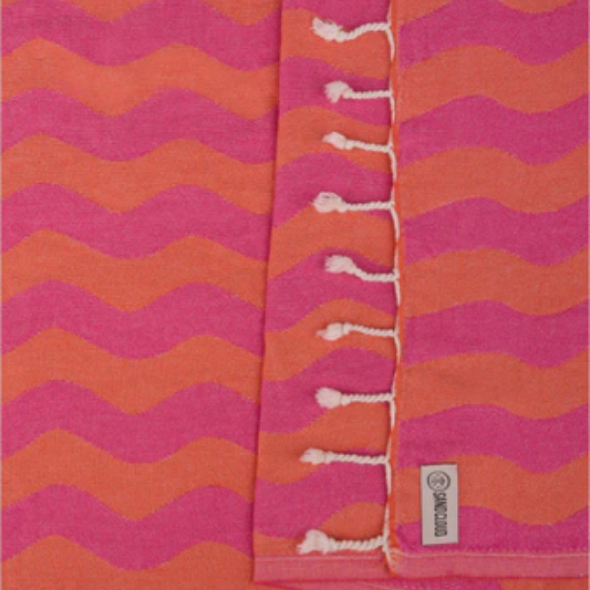 Sand Cloud Rumble Waves Towel in Coral