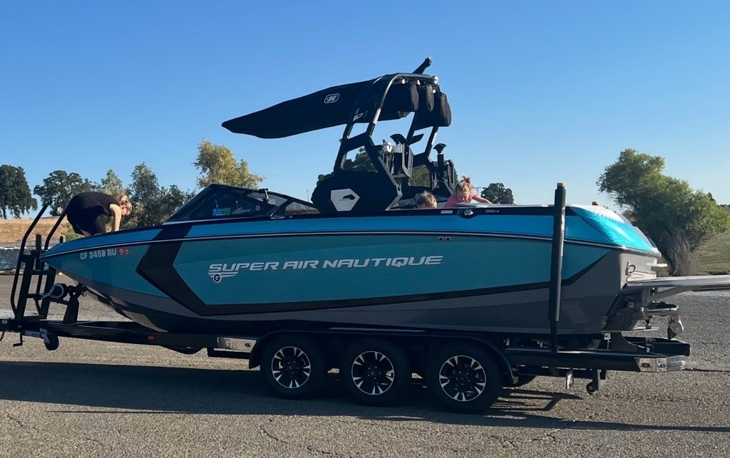 Nautique G25 with FCT19 Tower and Factory Bimini Double Up Storage Cover