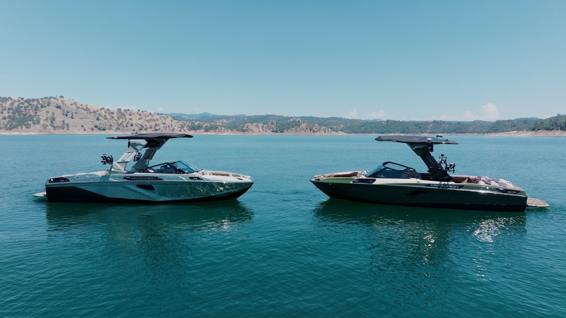 Two Centurion RS Series boats together on the water