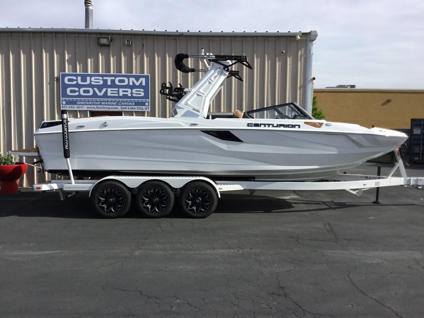 Centurion Fe25 with a DropZone Tower, FCTv3 bimini and Skylon SpringLock board racks - BoardCo