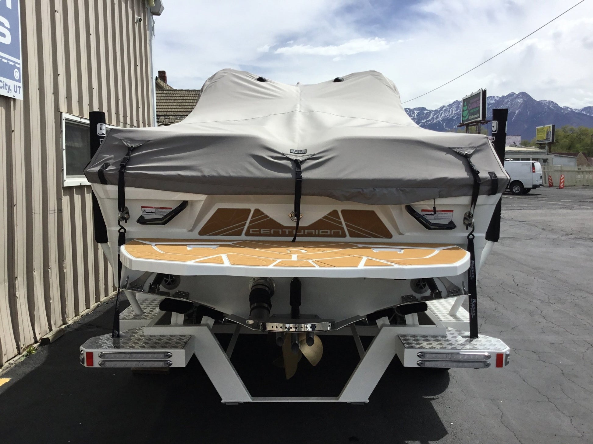 Centurion Fe25 with a DropZone Tower, FCTv3 bimini and Skylon SpringLock board racks - BoardCo