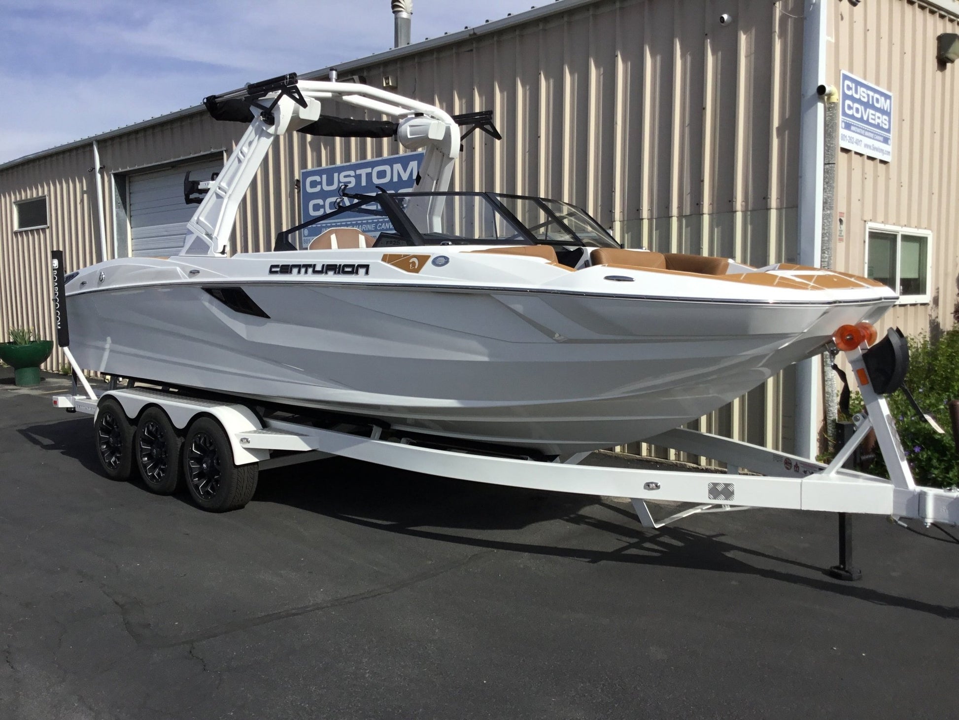 Centurion Fe25 with a DropZone Tower, FCTv3 bimini and Skylon SpringLock board racks - BoardCo