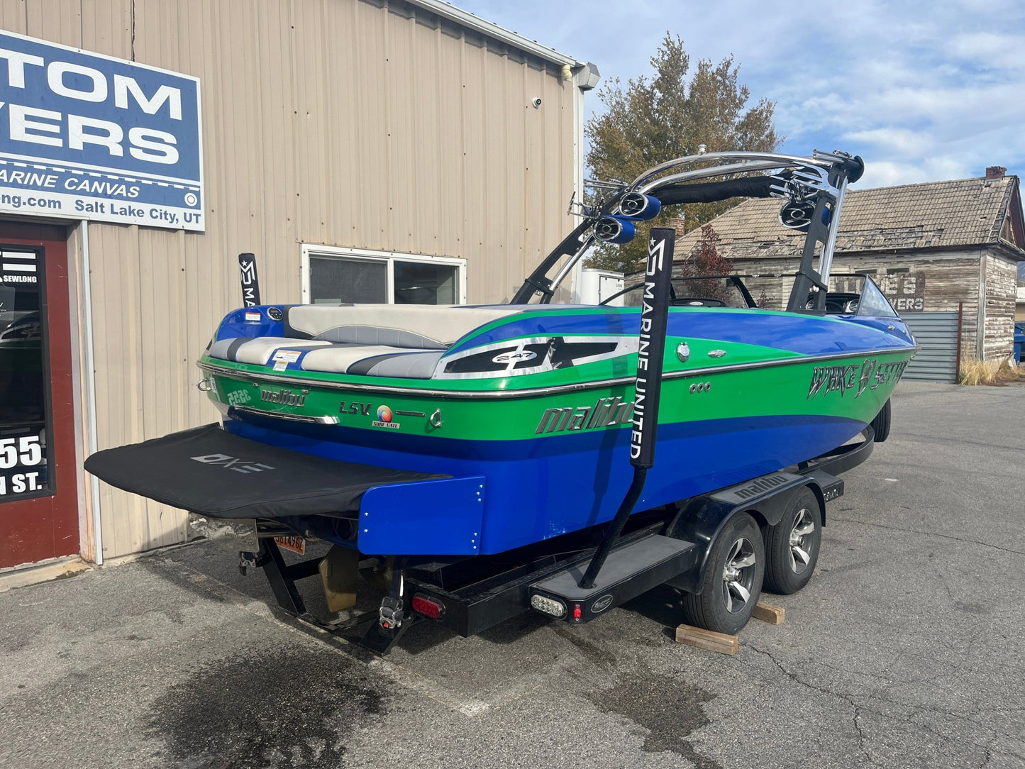 Malibu 247 with Illusion G3 tower and factory bimini Double Up Storage Cover - BoardCo