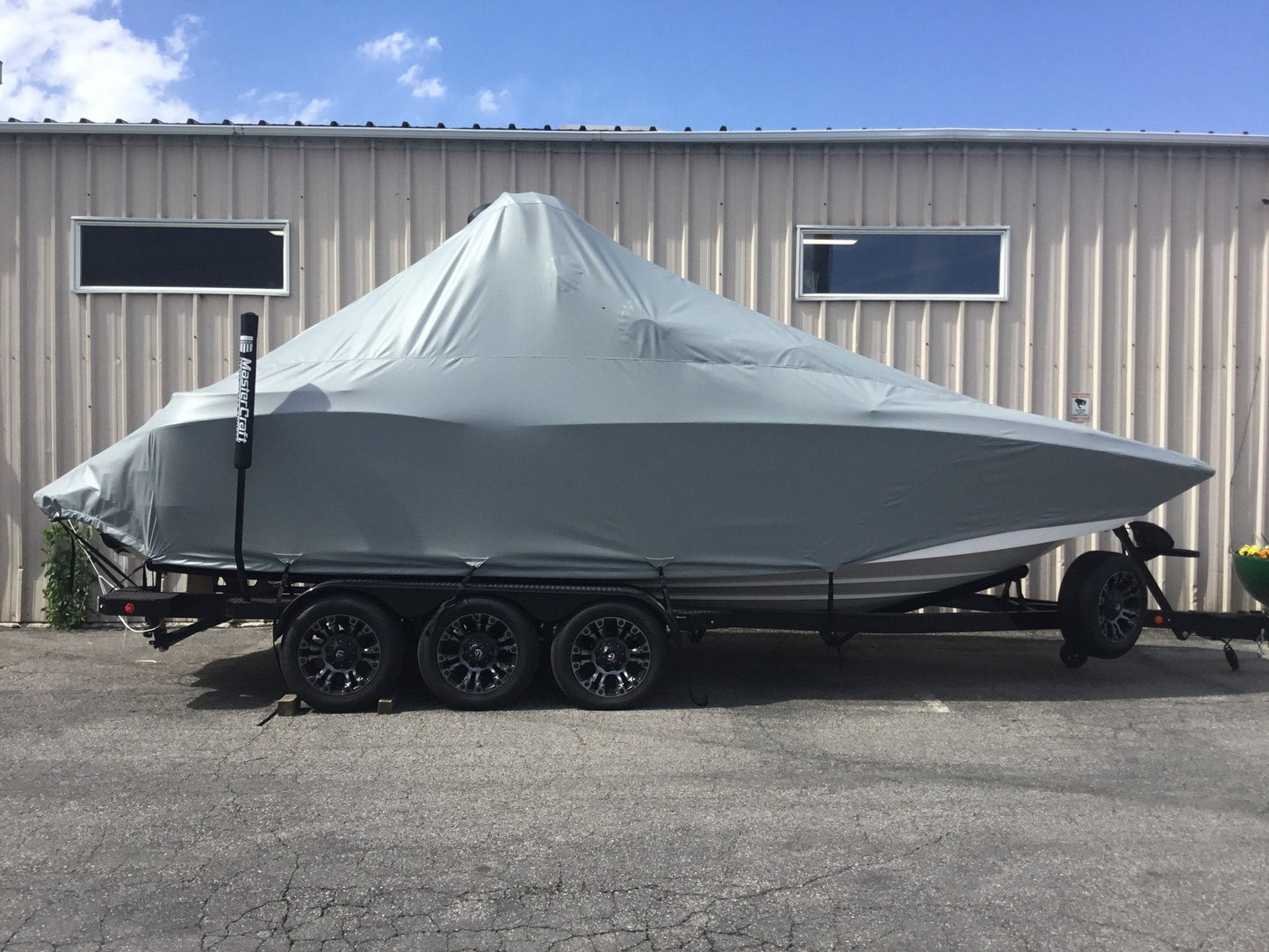 MasterCraft X24 with ZFT8 - ZFT10 tower and factory bimini Double Up Storage Cover - BoardCo