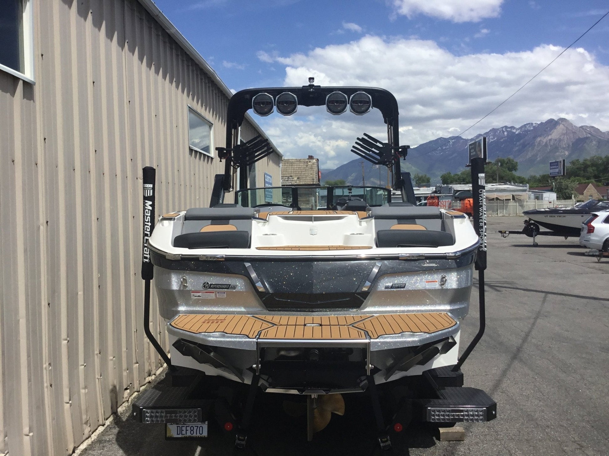 MasterCraft X24 with ZFT8 - ZFT10 tower and factory bimini Double Up Storage Cover - BoardCo
