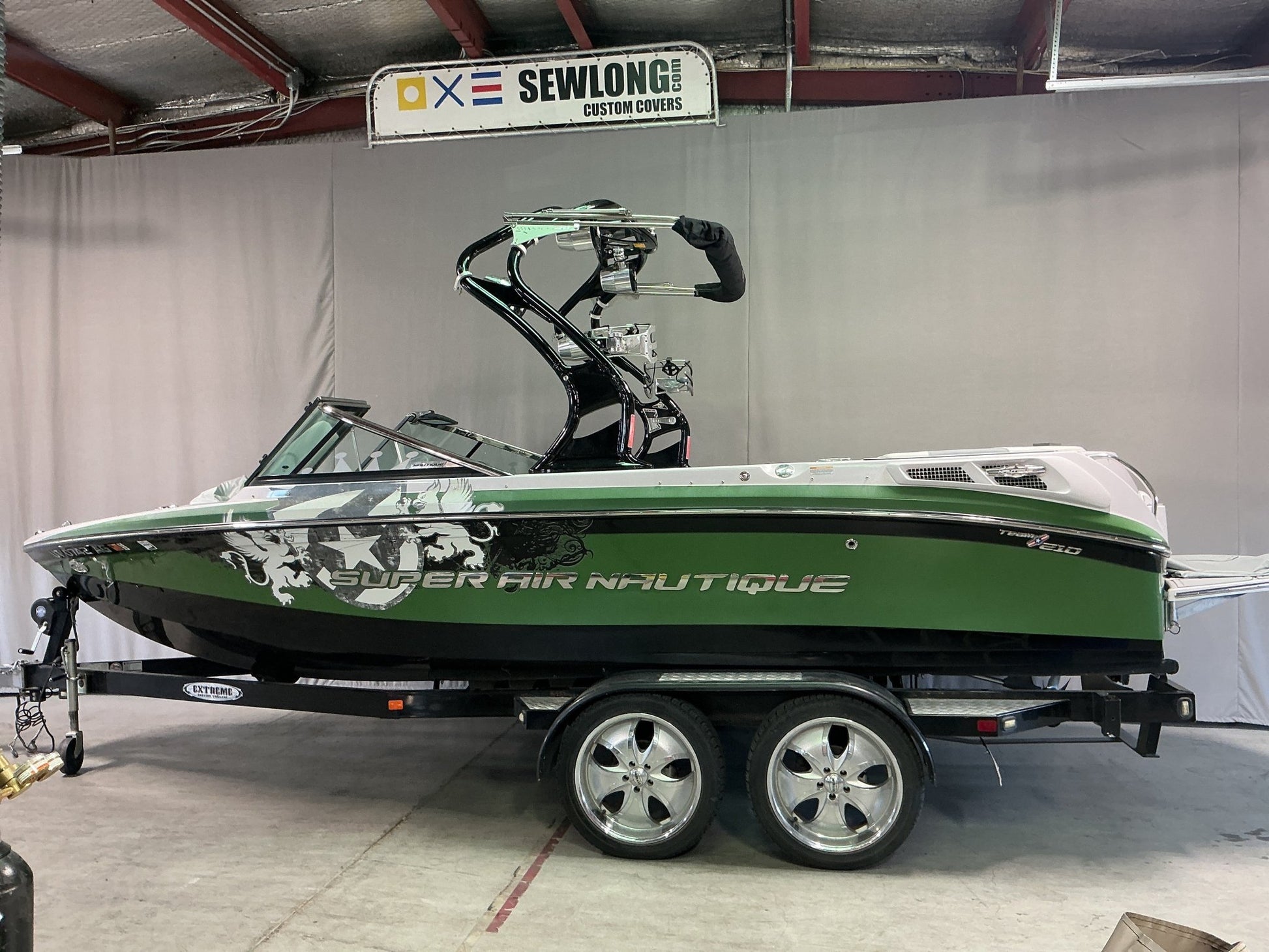 Nautique 210 with FCT - 3 Tower and Sewlong Bimini Double Up Storage Cover - BoardCo