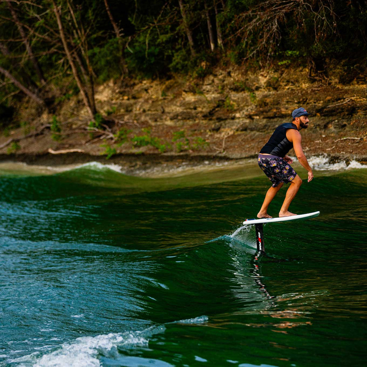 Phase 5 Chopstick Wake Foil Board 2027 – rider and foil board above the water