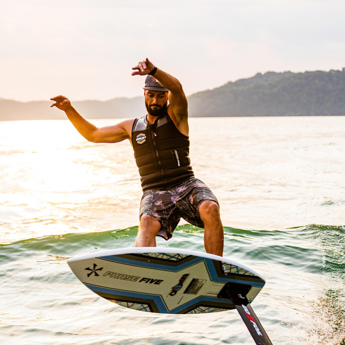 Phase 5 Chopstick Wake Foil Board 2027 – rider and foil board above the water