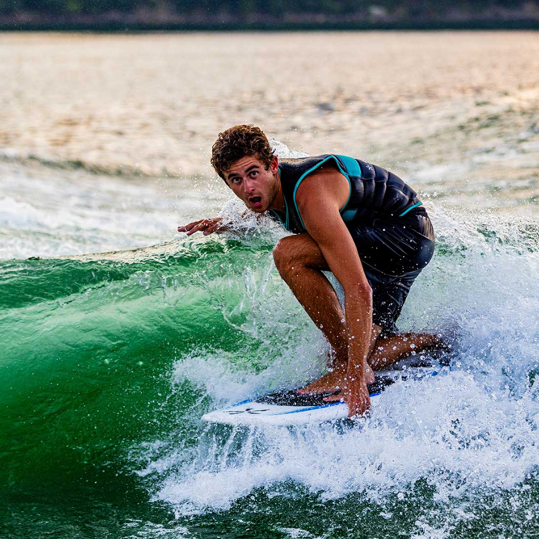 Phase 5 Elixir Wakesurf Board 2027 – rider surfing the wave