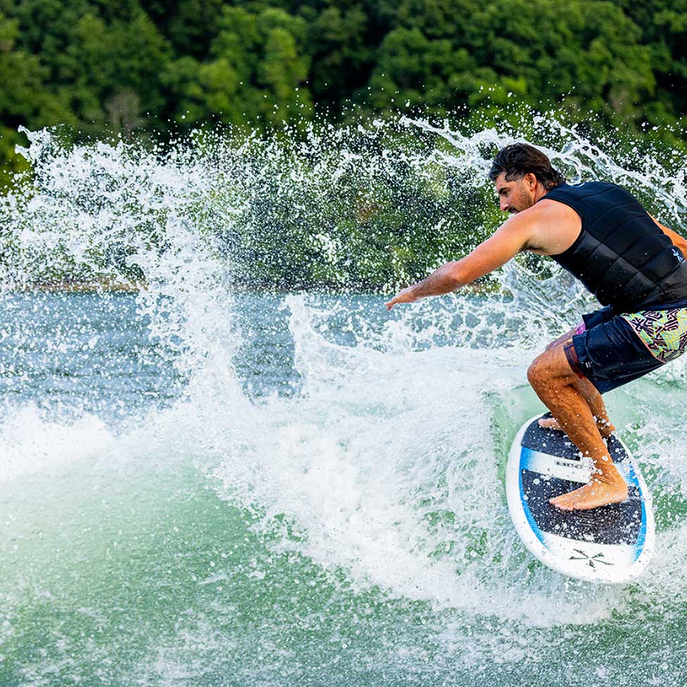 Phase 5 Elixir Wakesurf Board 2027 – rider turning on the wave