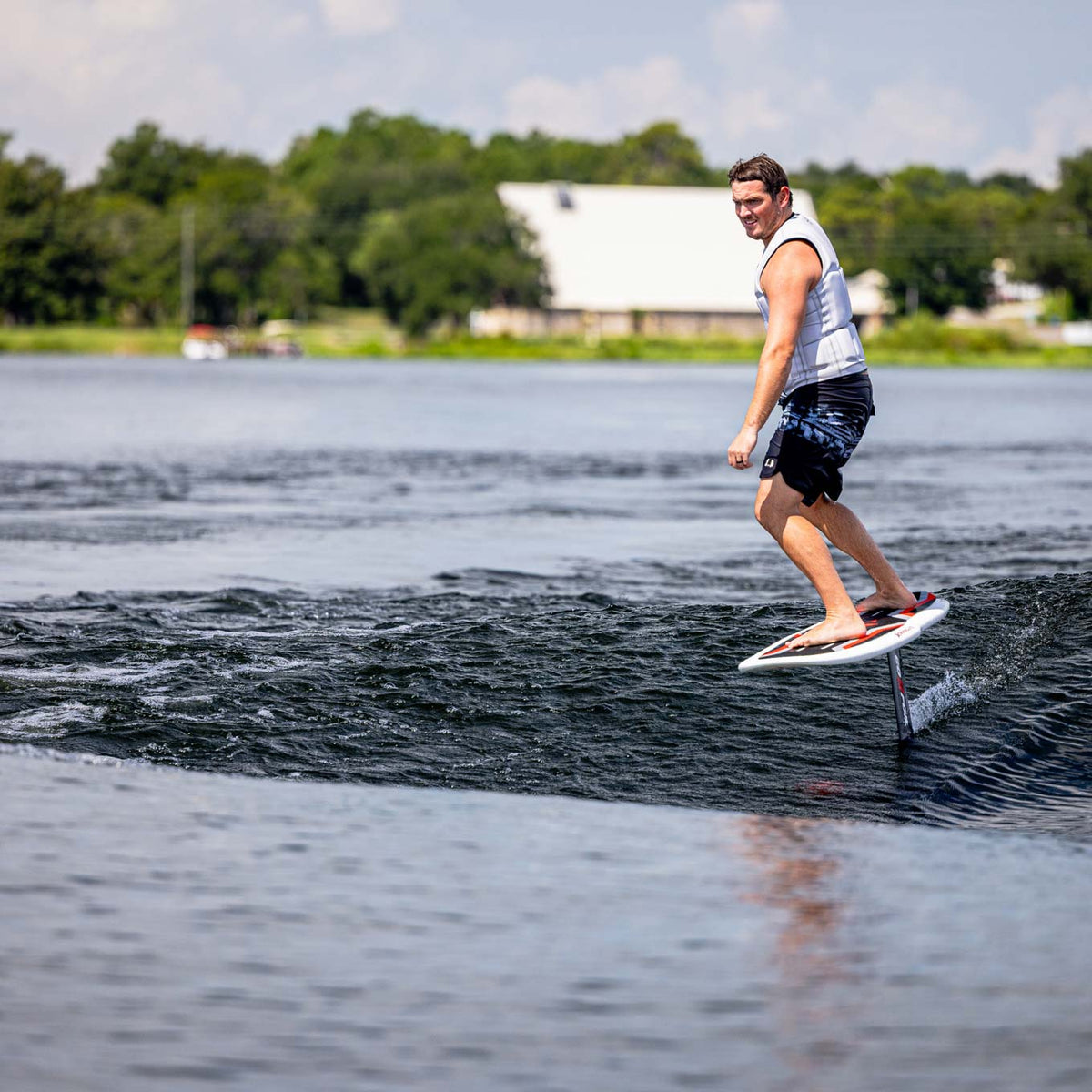 Phase 5 Gizmo Wake Foil Board 2027 – rider and foil board above the water