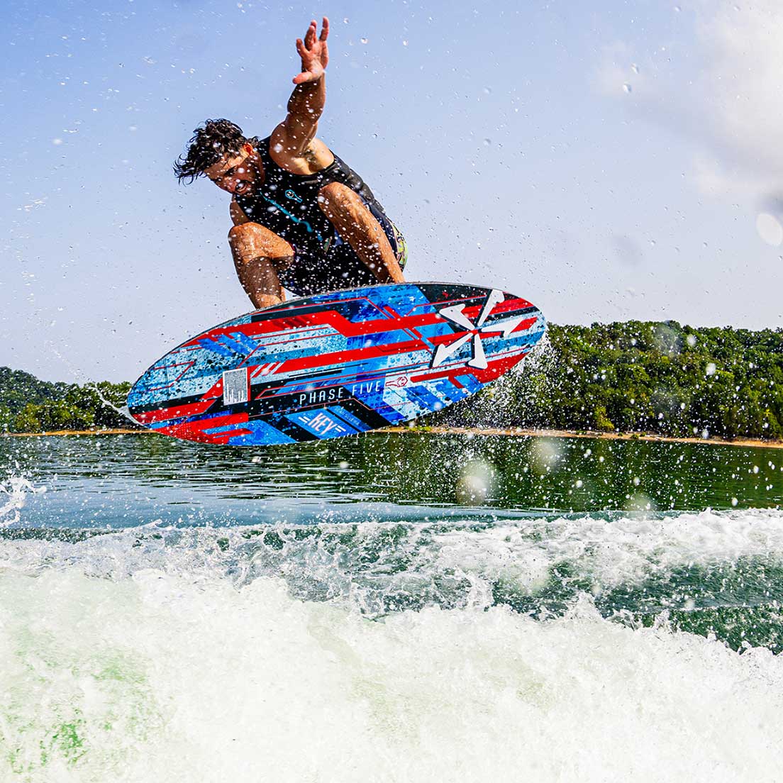 Phase 5 Key V2 Wakesurf Board 2027 – rider and board during an aerial maneuver