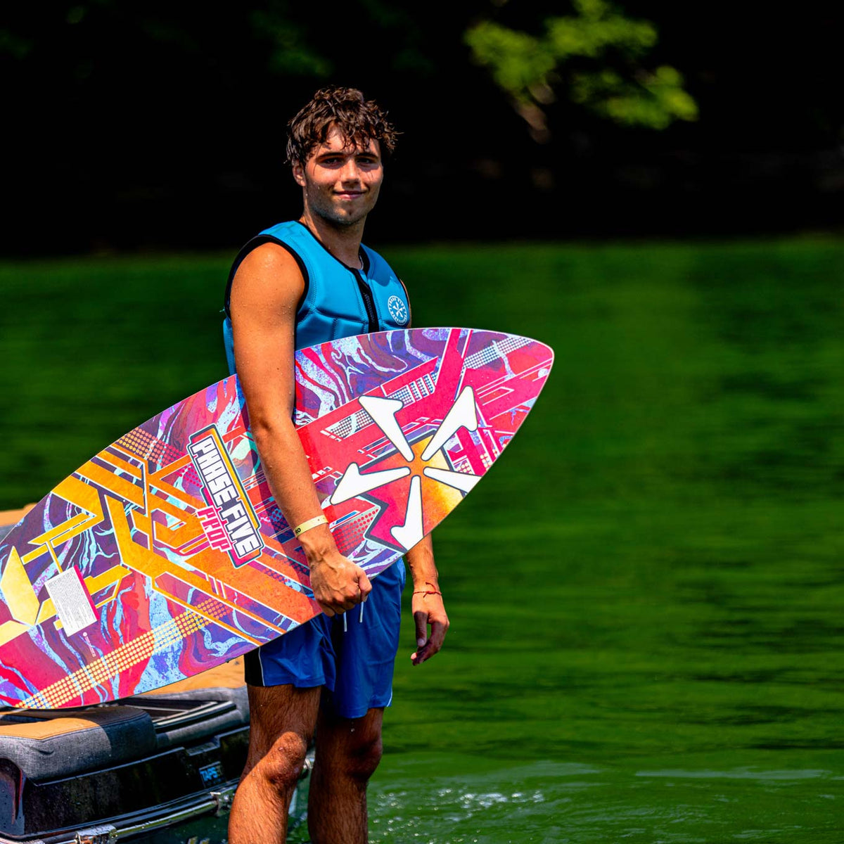 Phase 5 Prop CL Wakesurf Board 2027 – board and rider outdoors