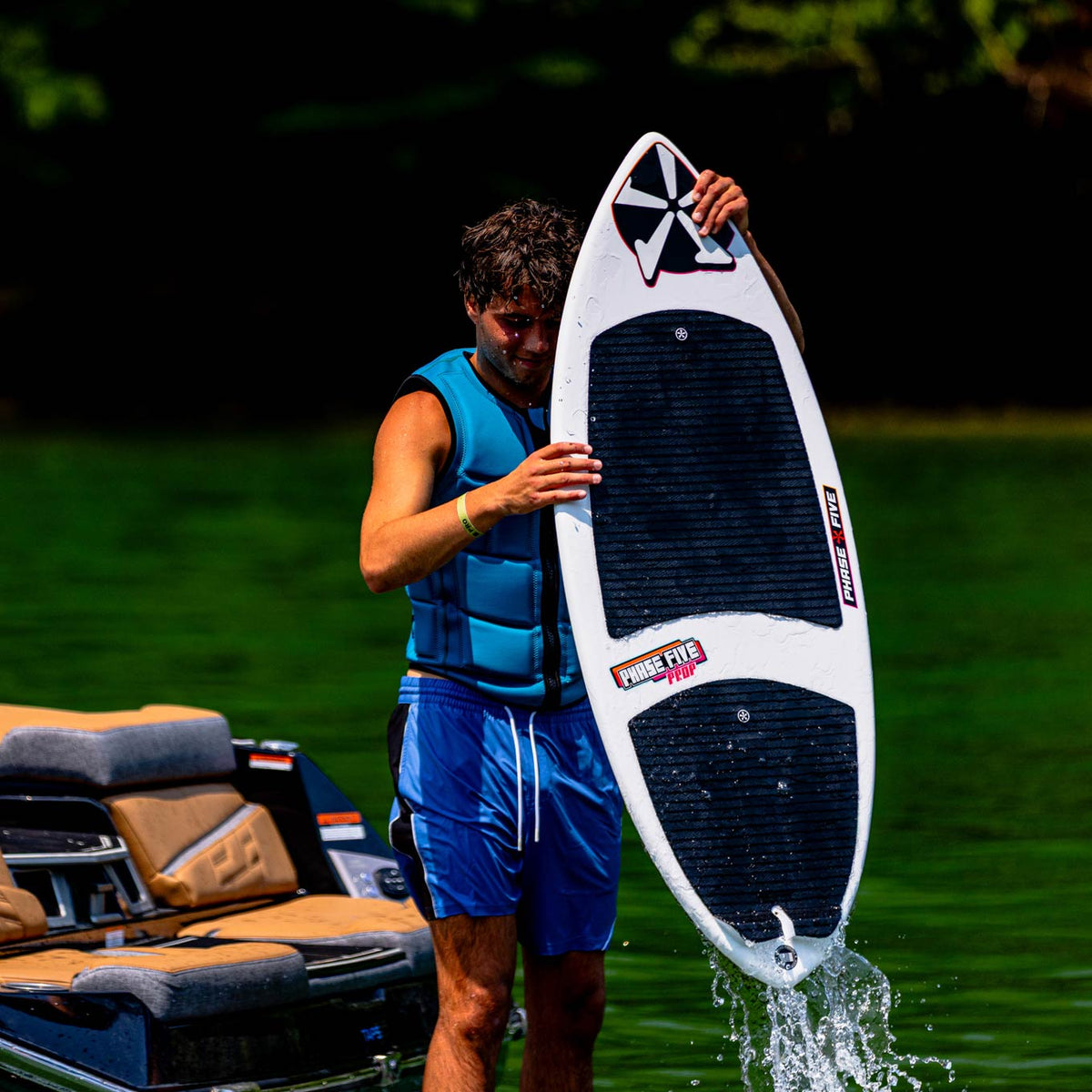 Phase 5 Prop CL Wakesurf Board 2027 – deck view outdoors