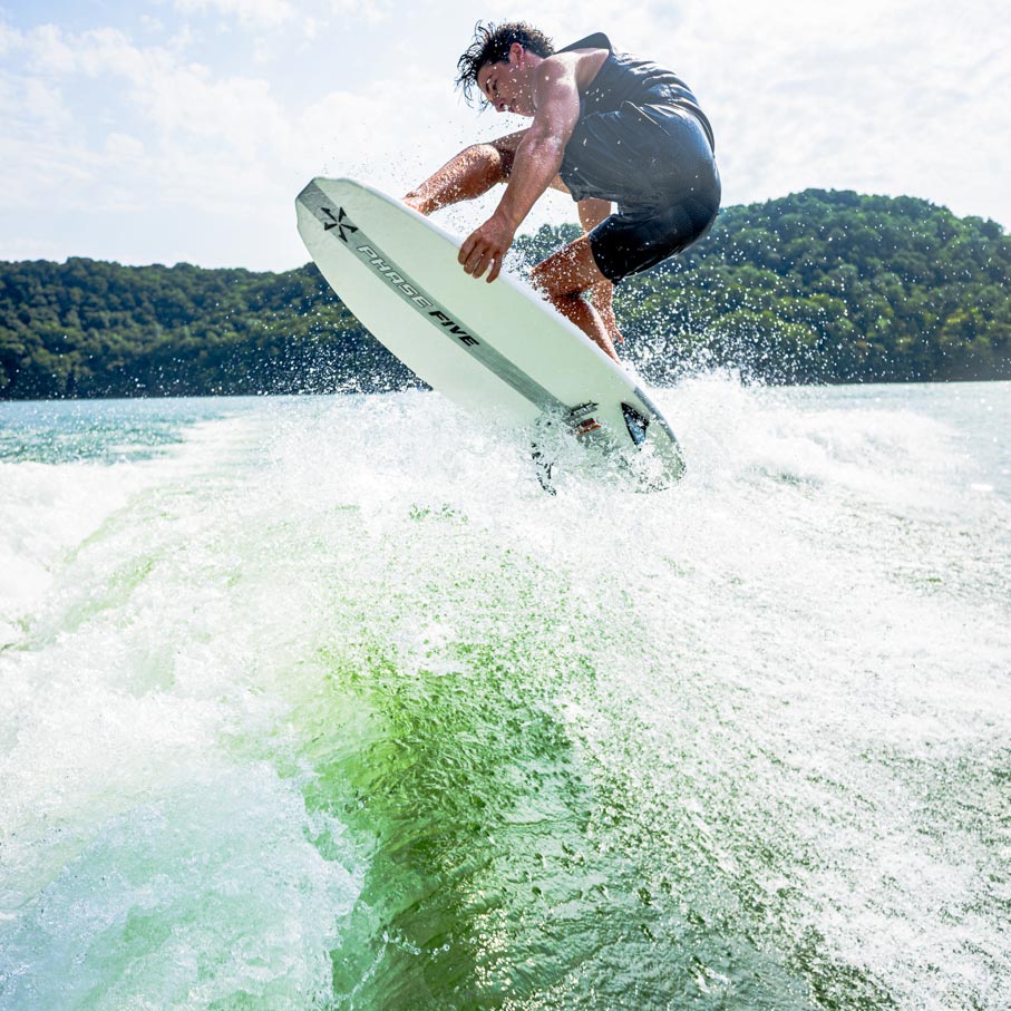 Phase 5 Switchblade Wakesurf Board 2027 – rider surfing the wave