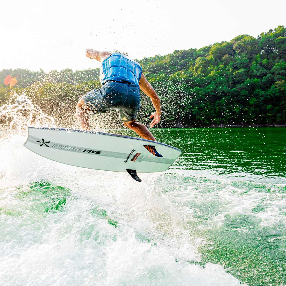 Phase 5 Viper Stealth Wakesurf Board 2027 – rider and board during an aerial maneuver