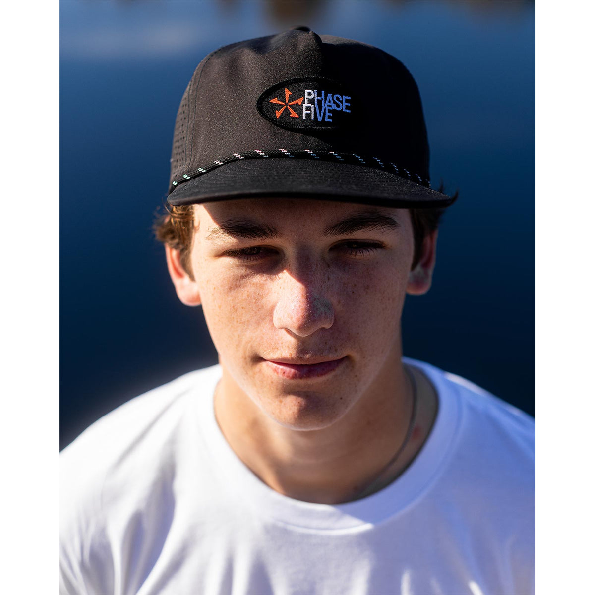 Phase 5 Classic Logo Premium Surf Hat, worn by the water