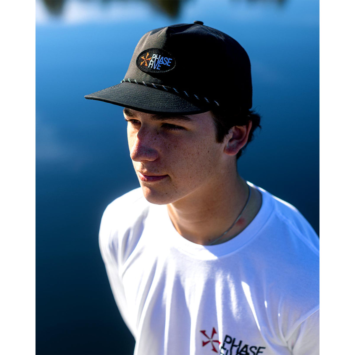 Phase 5 Classic Logo Premium Surf Hat, side view while worn