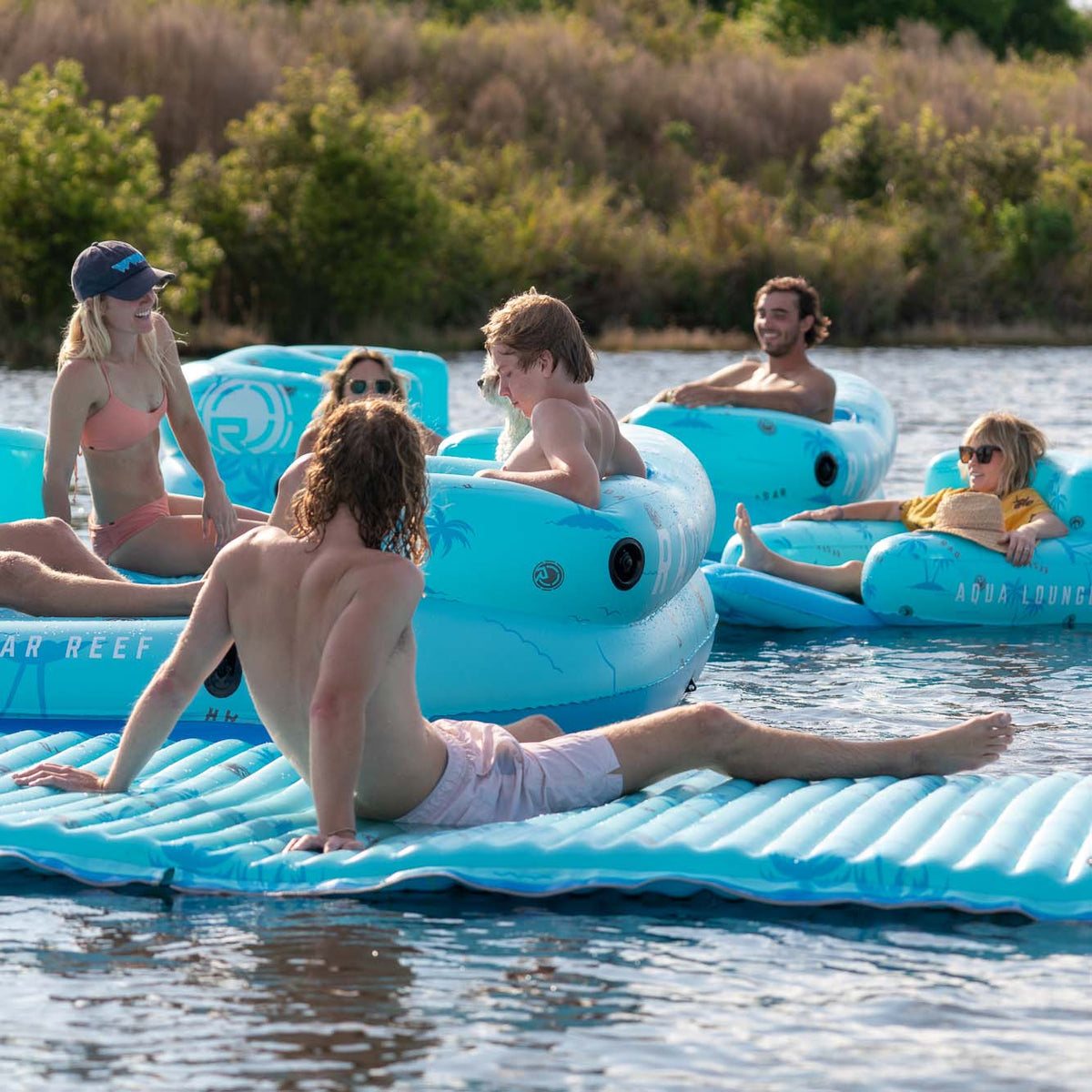 Radar Cloud Water Mat 5 ft. x 10 ft., lounging on the water