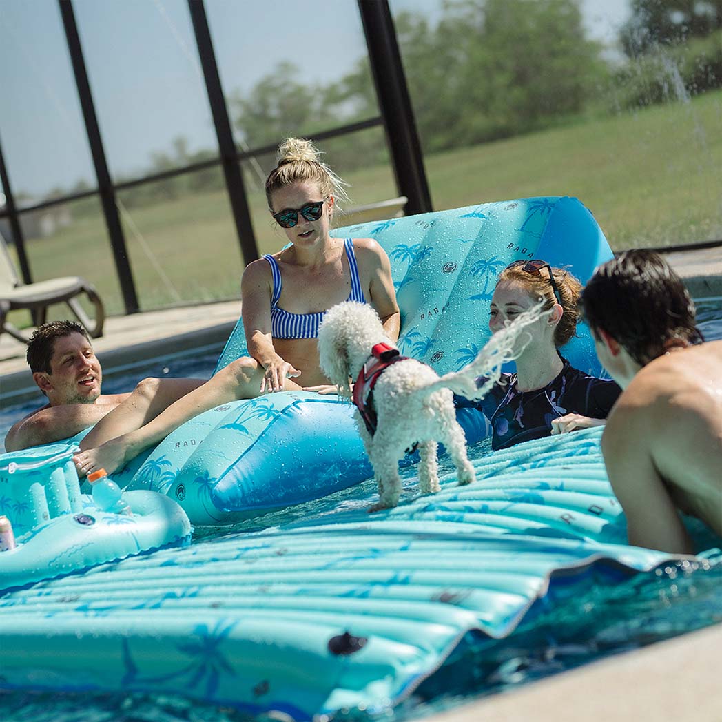 Radar Cloud Water Mat 5 ft. x 10 ft., lounging on the water